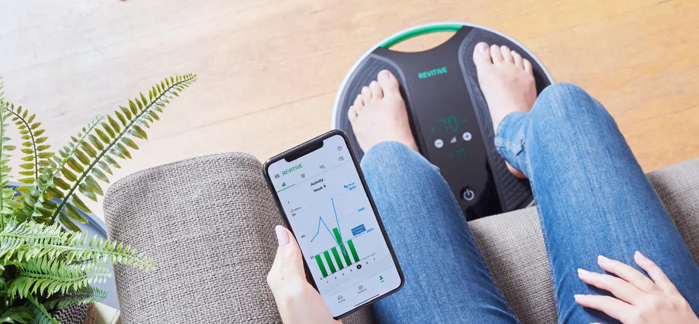 woman using medic coach with the app on her phone