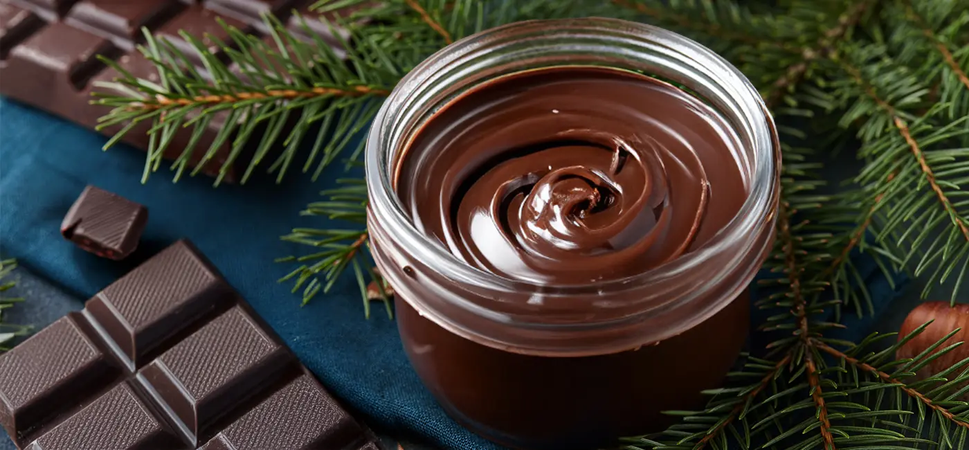 Dark chocolate spread and bars, with festive pine needles